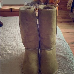 Rate Tall Ugg boots in sage green.
